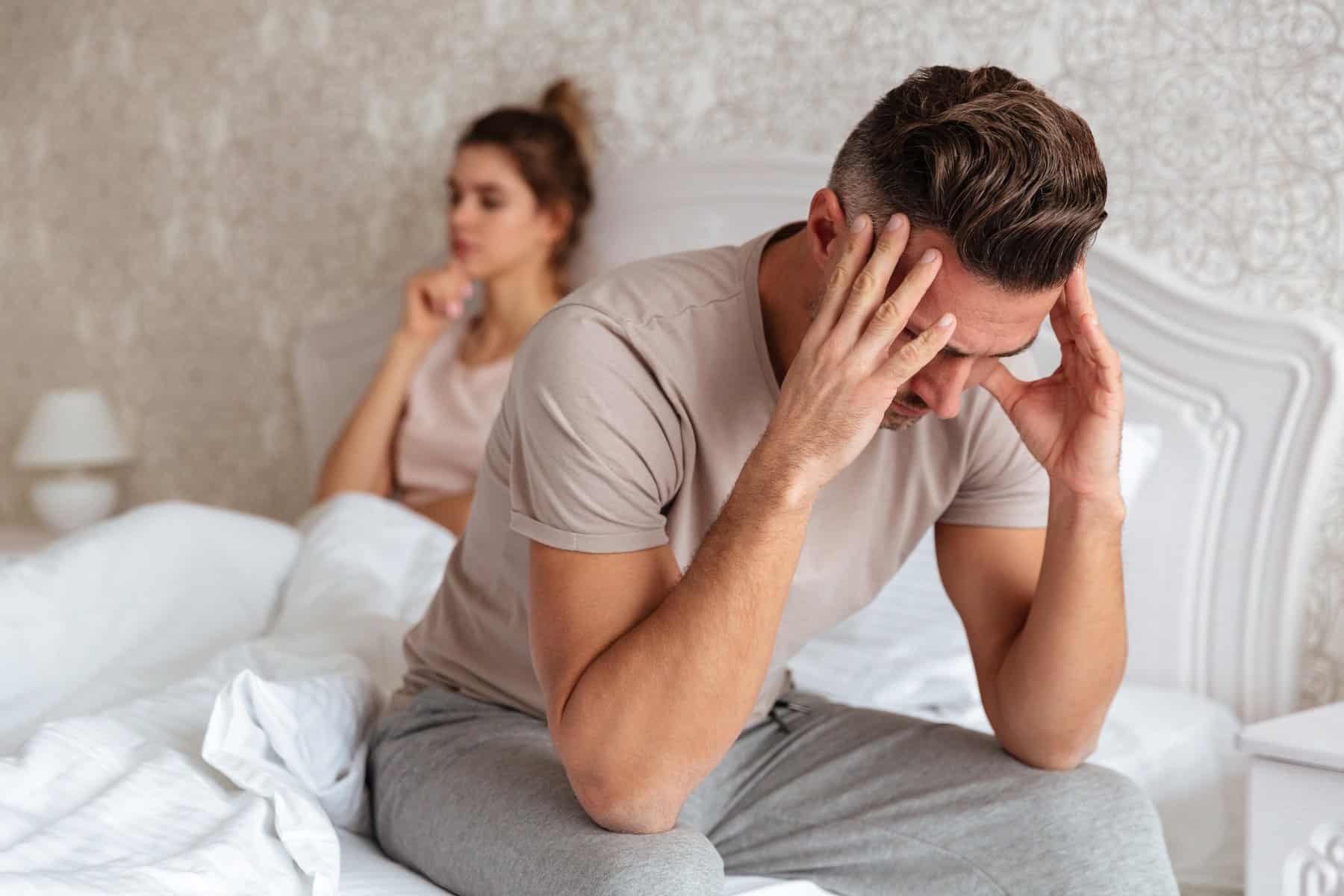 Sexually frustrated couple on the bed